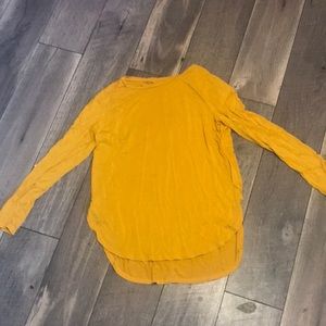 yellow long sleeve shirt